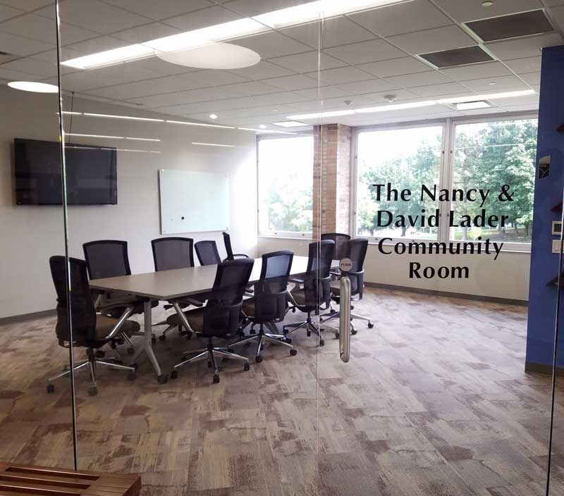 Community Room with Long table and desk chairs