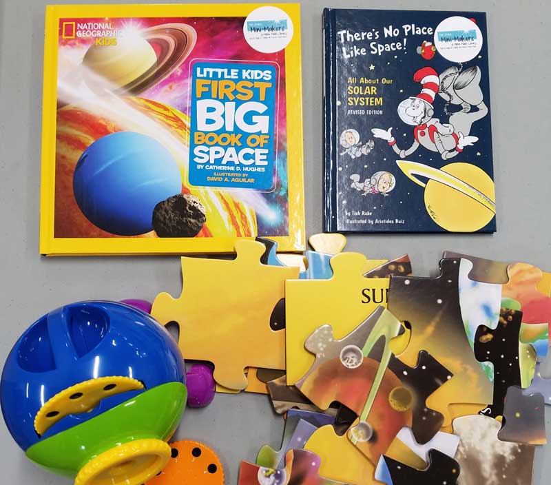 Solar System Puzzle and books